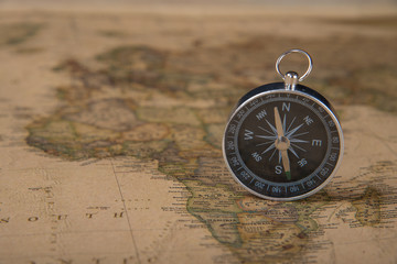 Fototapeta na wymiar Compass on the map
