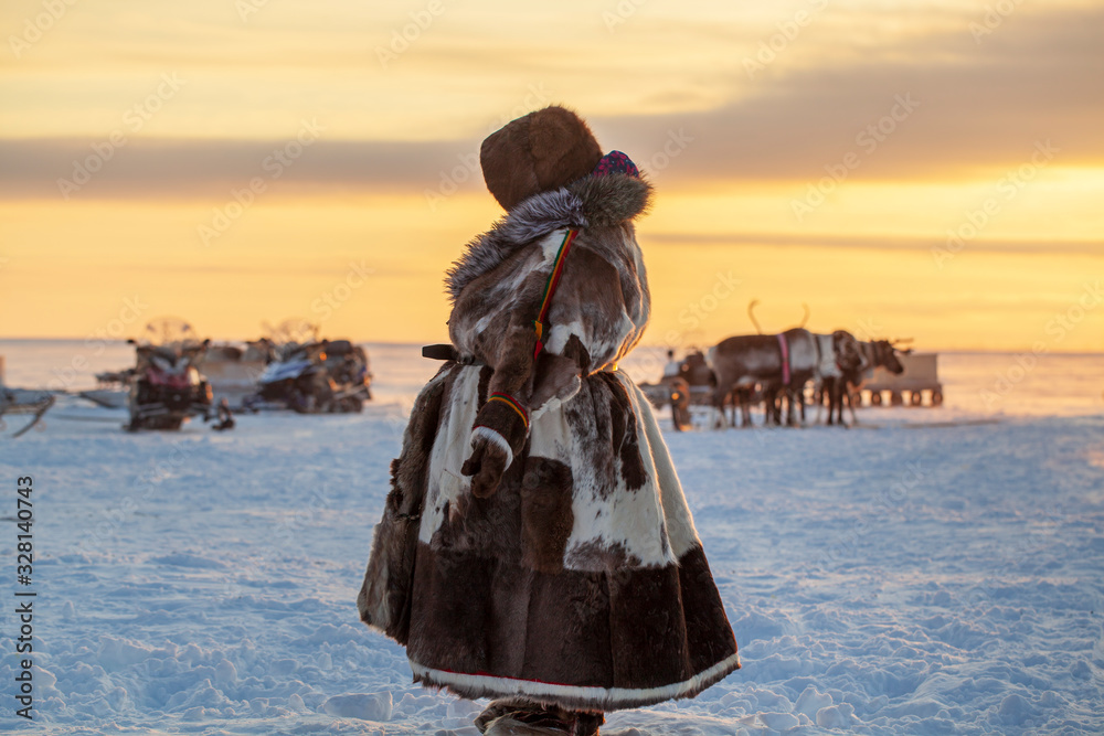 Wall mural  Far North, Yamal Peninsula, Reindeer Herder's Day, local residents in national clothes of Nenets