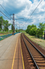 Railroad suburban halt in daytime