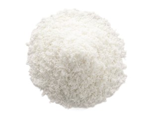 Fototapeta na wymiar Heap of fresh coconut flakes isolated on white, top view