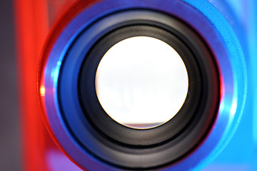 Old slide projector with slide frame photographed in the studio with flash light