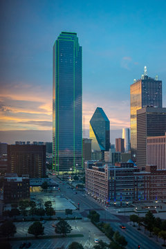 Sunlight breaks through the clouds in downtown Dallas, Texas