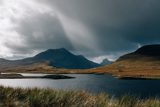 Storm clouds over Loch an Ais. Highlands, Scotland, UK
