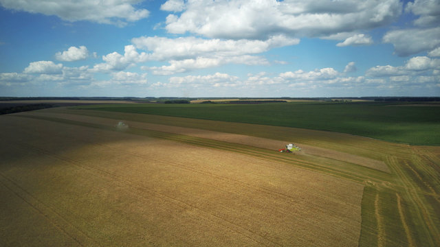 Drone view of harvesting on the field.