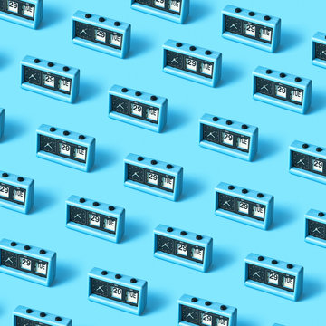 Pattern from a desk clock with a calendar in retro style on a bl