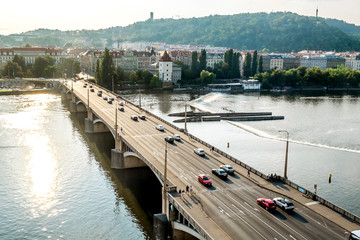 Jiraskuv bridge and Embankment on the Vltava river in Prague.