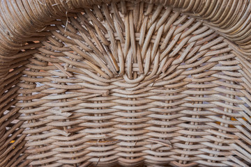 Handmade rattan woven are commonly used for traditional chair in rural Asia, especially in Indonesia. Antique pattern background for vintage theme design.