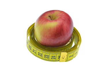 red apple with measuring tape isolated on white background