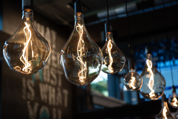 clear decorative light bulbs hanging from ceiling