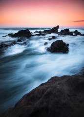 Fototapeta na wymiar Long Exposure of Clear Blue Water at Sunset in Maui Hawaii