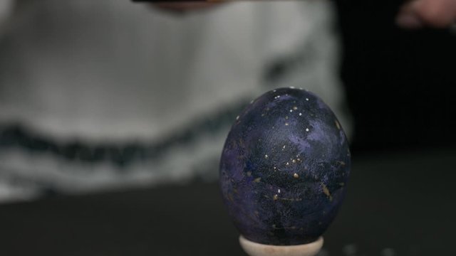 painting eggs for Easter. Painting with a sponge and different colors. preparation Spaceballs