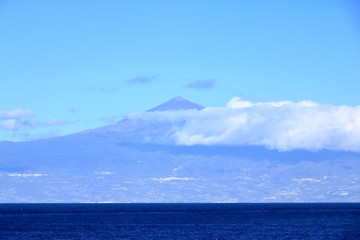 Teide volcano in Tenerife seen a boat in the ocean. Canary islands, Spain