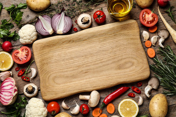 Flat lay composition with fresh products on wooden table, space for text. Healthy cooking