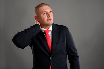 Businessman has pain of the cervical at work