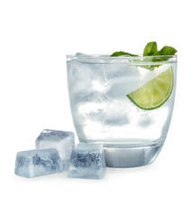 Glass of refreshing drink with ice cubes on white background