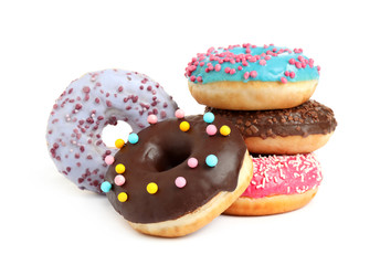 Sweet tasty glazed donuts on white background