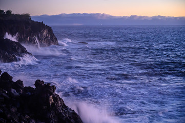 Dangerious ocean stormy waves hits black lava rocks on La Palma island, Canary, Spain
