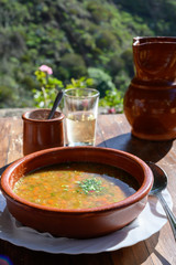 Homemade vegetables soup served with Canarian gofio flour based on local recipe of Masca village, Tenerife, Spain