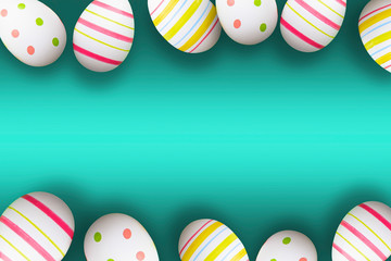 Colorful easter eggs on a green background with soft shadows