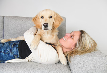 A woman with her golden Retriever dog