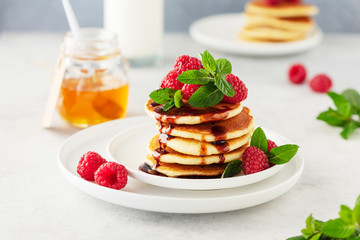 Sweet pancakes with raspberry