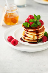 Sweet pancakes with raspberry