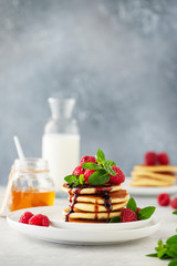 Sweet pancakes with raspberry