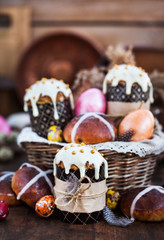 Holiday Easter cakes, hot cross buns and colorful painted eggs