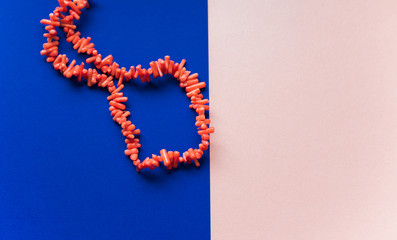 Natural gemstone, coral stone accessorize close up, boho details