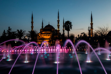 Fototapeta na wymiar ISTANBUL, TURKEY - JANUARY 1, 2019: Park in Sultanahmet Square with the fountain, in Istanbul, Turkey.