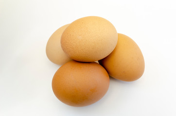 fresh chicken eggs on a white background