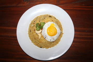 top view of fried egg on a rice plate