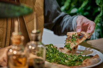 Vegan pizza with fresh arugula