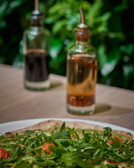 Vegan pizza with fresh arugula