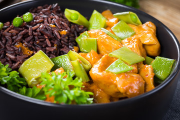 Thai red curry with chicken and black rice.