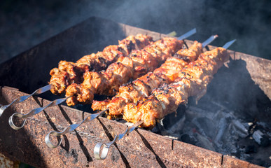 Barbecue. Cooking Shish kebab meat on the grill.