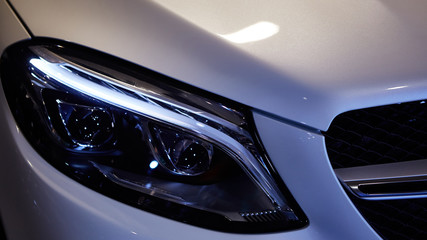 Close up headlights of car. Shallow dof.