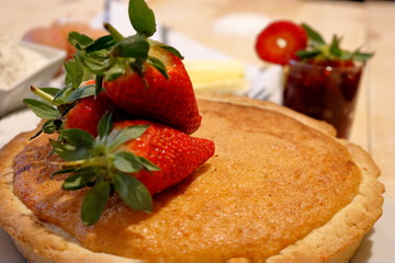 Bakewell tart with strawberries on the top