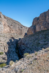 Fototapeta na wymiar Arrow Canyon is a deep and narrow box to slot canyon in a wildnerness area north of Las Vegas with hiking trails and bolted sport climbing in limestone caves.