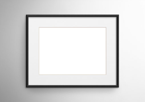 Empty frame. Blank black mounted landscape frame on white wall