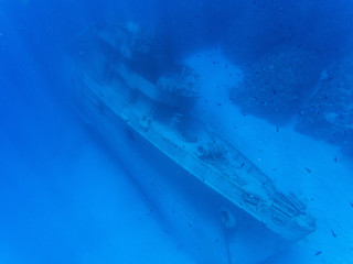 A huge sunken abandoned ship at a depth of 30 meters in crystal clear water. Grand Cayman.