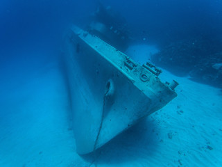 A huge sunken abandoned ship at a depth of 30 meters in crystal clear water. Grand Cayman.