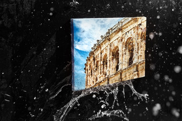 Photo printed on canvas with gallery wrap technique, splashing water drops on black background