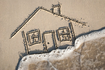 Flood waters rushing up around a simple house drawn in the sand