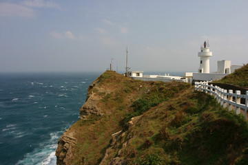 Fototapeta na wymiar Sunny view of the beautiful Bitoujiao Lighthouse