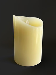 Beautiful and realistic natural color candle front view isolated on black background. Wax candle burning on black background, closeup