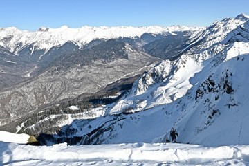 snow-capped mountain peaks in a ski resort