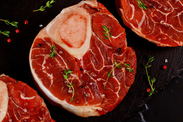 Beef shank bone in with seasonings. Close up.