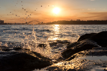 Splashing waves at sunset, Sydney Australia