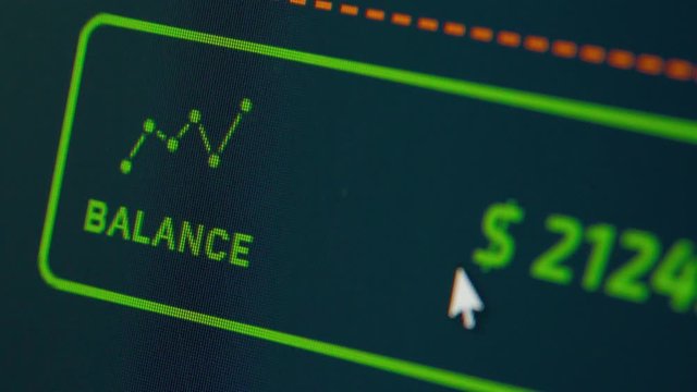 Macro view of a monitor with online financial statistics. Balance monitoring. Stock market, financial statistics monitoring